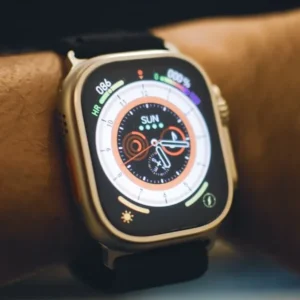 A close up of a person wearing a smart watch.